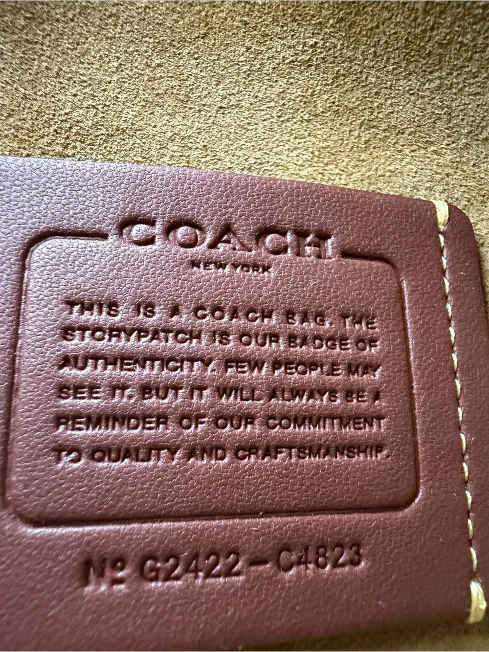 Coach Black Leather Shoulder Bag with Gold 'C' Accent